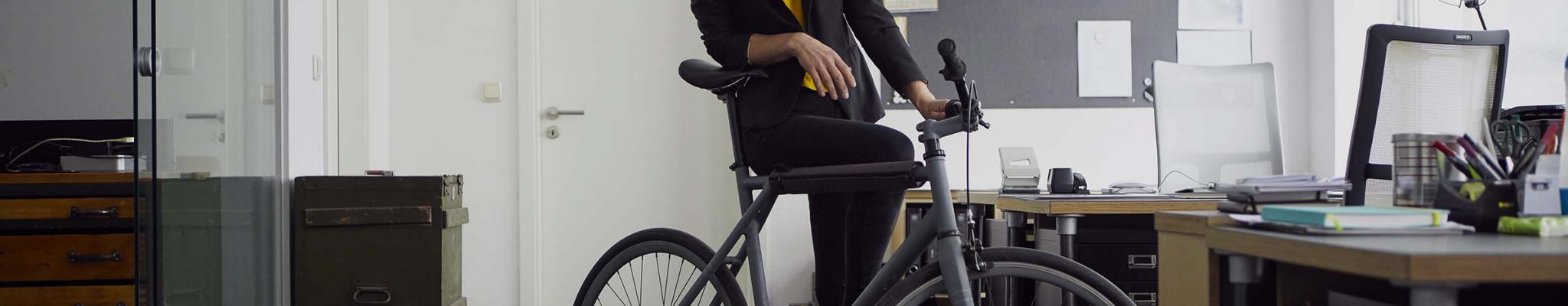 businesswoman-with-bicycle-in-her-start-up-company-JH3WZ3K.jpg